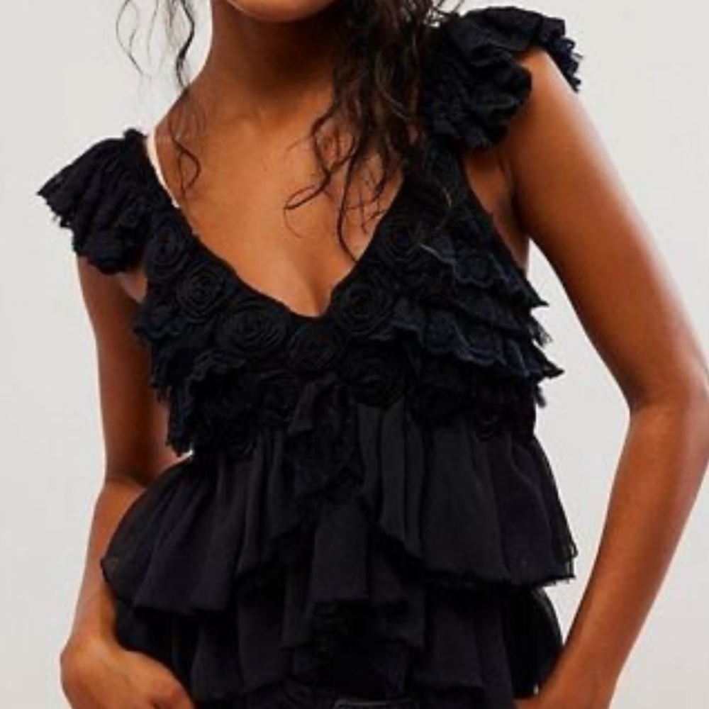 NWOT All Dolled Up bodysuit by Intimately Free People in size Medium